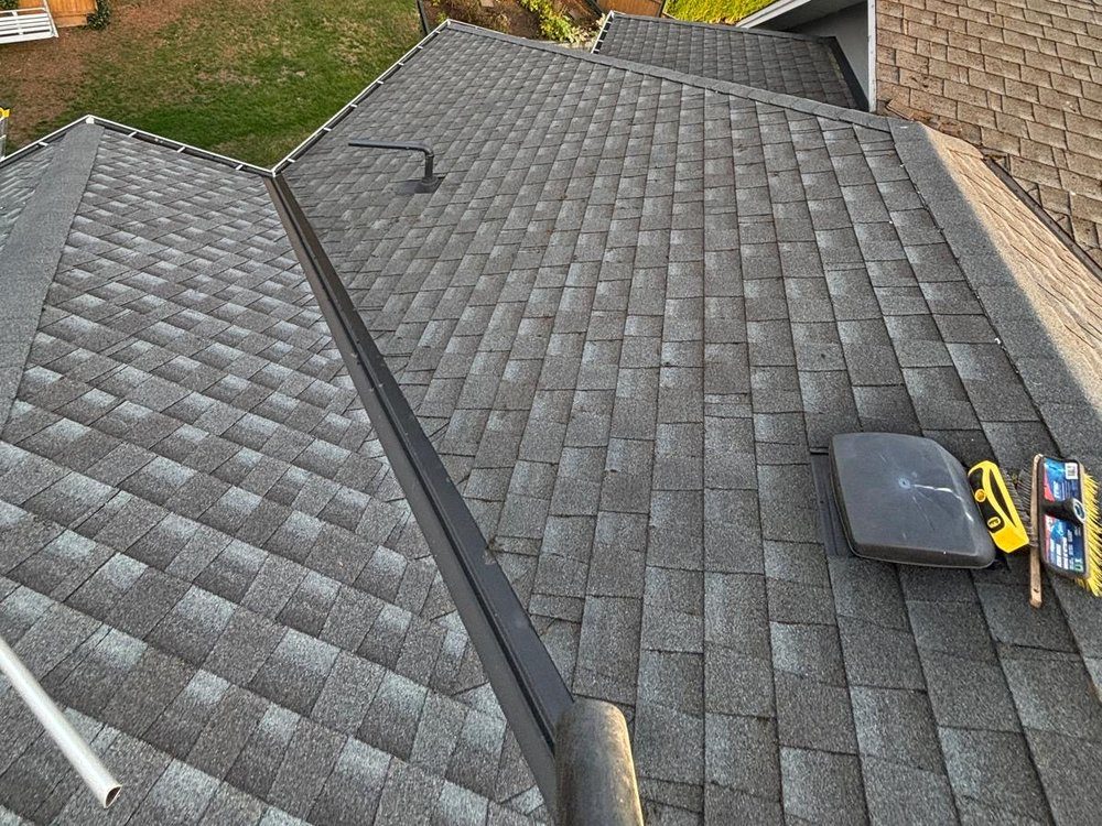 The same roof after moss removal